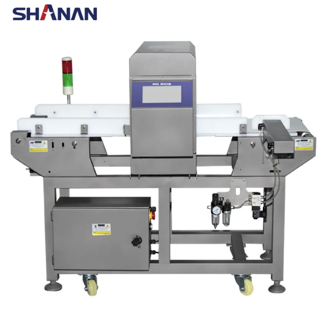 Máy dò kim loại bò viên băng tải màn hình cảm ứng, hãng động Shanan